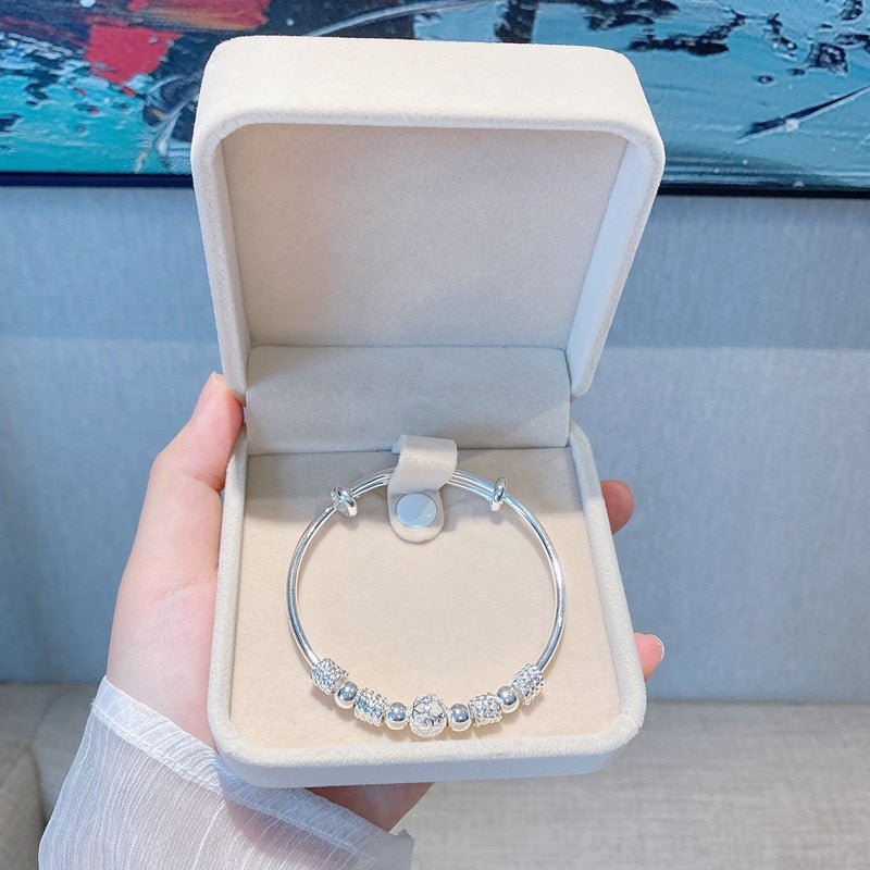 Nuvella - Elegant Silver Lucky Bead Bracelet