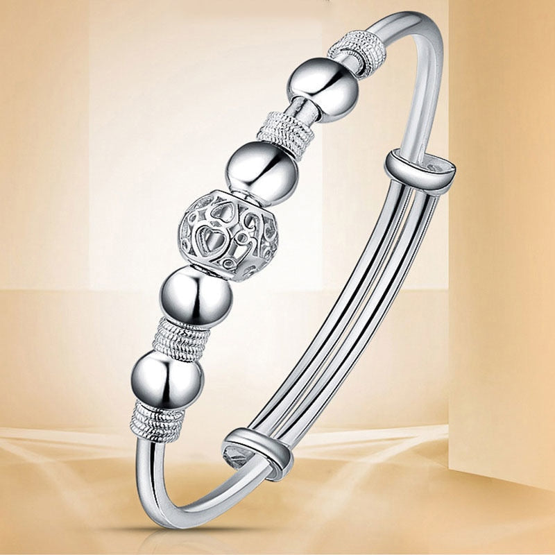 Nuvella - Elegant Silver Lucky Bead Bracelet