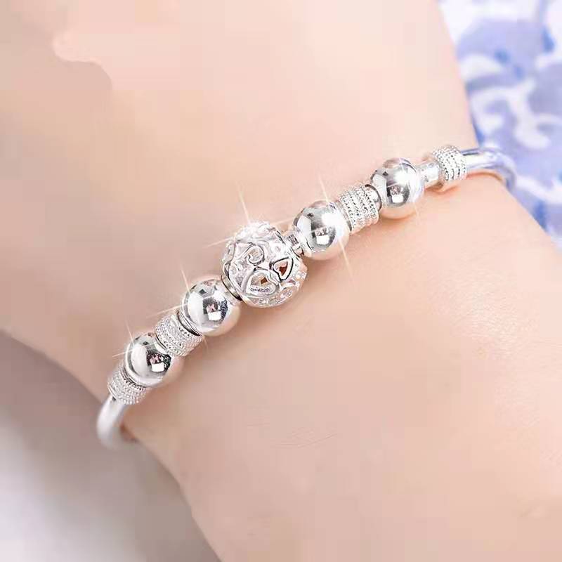 Nuvella - Elegant Silver Lucky Bead Bracelet