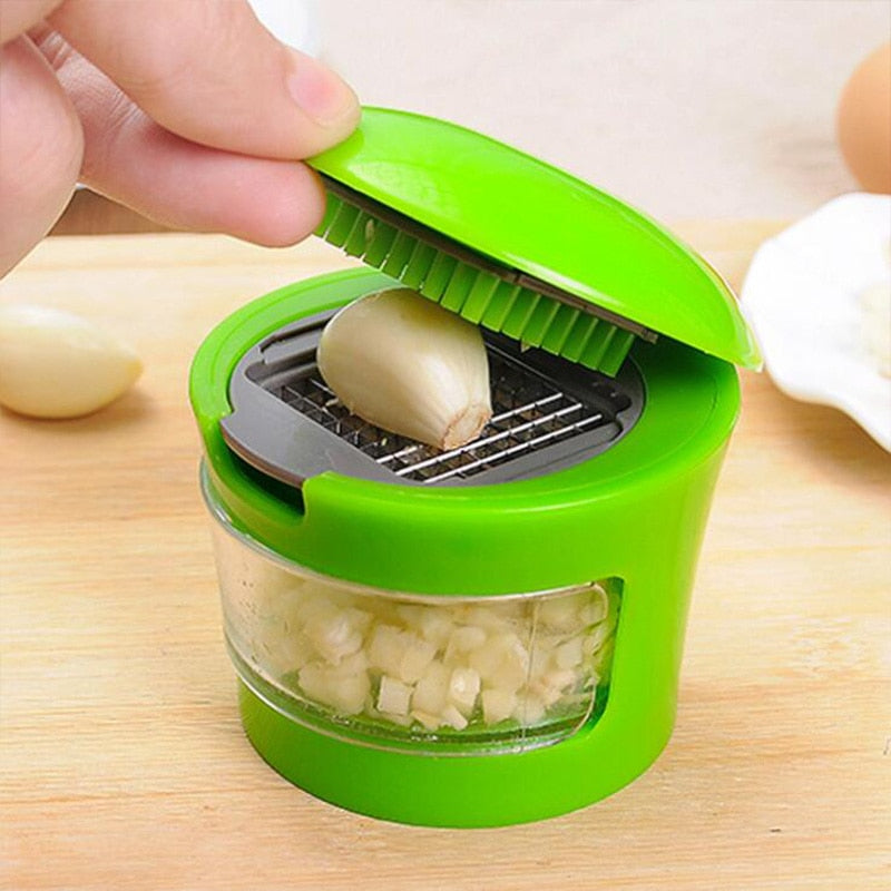 GarlicPress Pro - Compact Garlic Press with Catch Reservoir