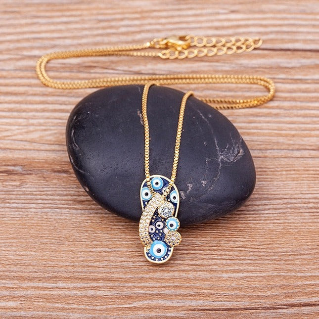 Selma Gold Flip Flop Necklace - Evil Eye Charm Pendant