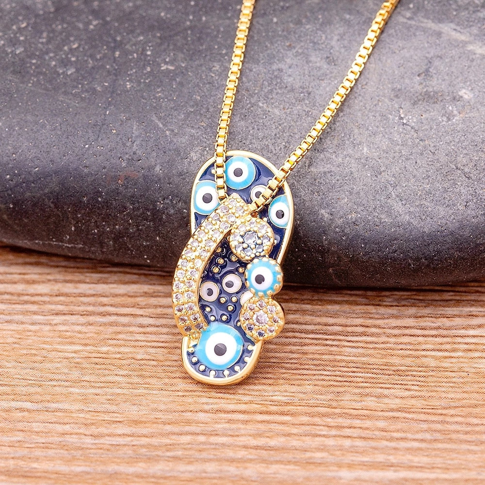 Selma Gold Flip Flop Necklace - Evil Eye Charm Pendant