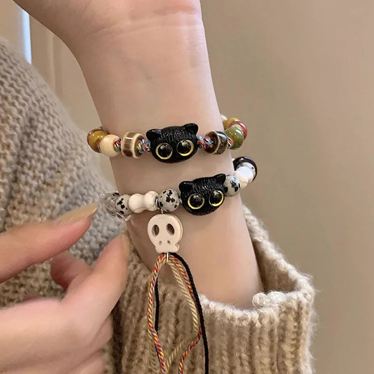Kyzora Bracelet - Playful Skull and Kitten Charm Design