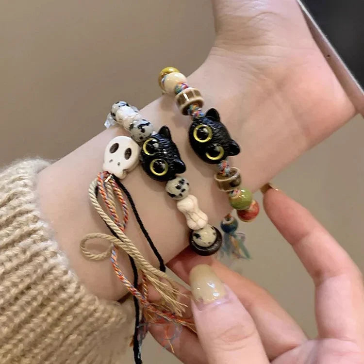 Kyzora Bracelet - Playful Skull and Kitten Charm Design