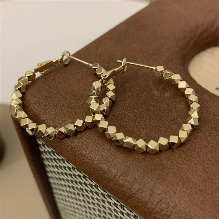 Nina Hoop Earrings - Timeless Faceted Design