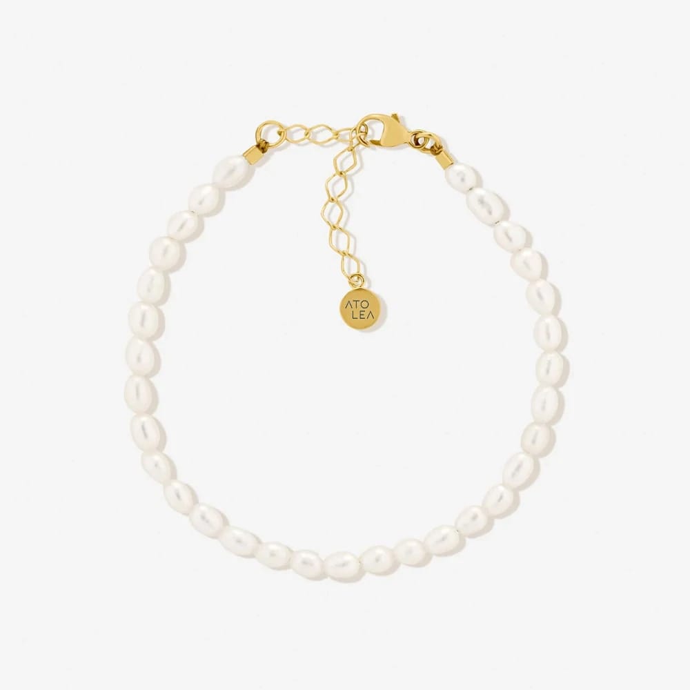 Evarina - Freshwater Pearl Bracelet with Elegant Charm