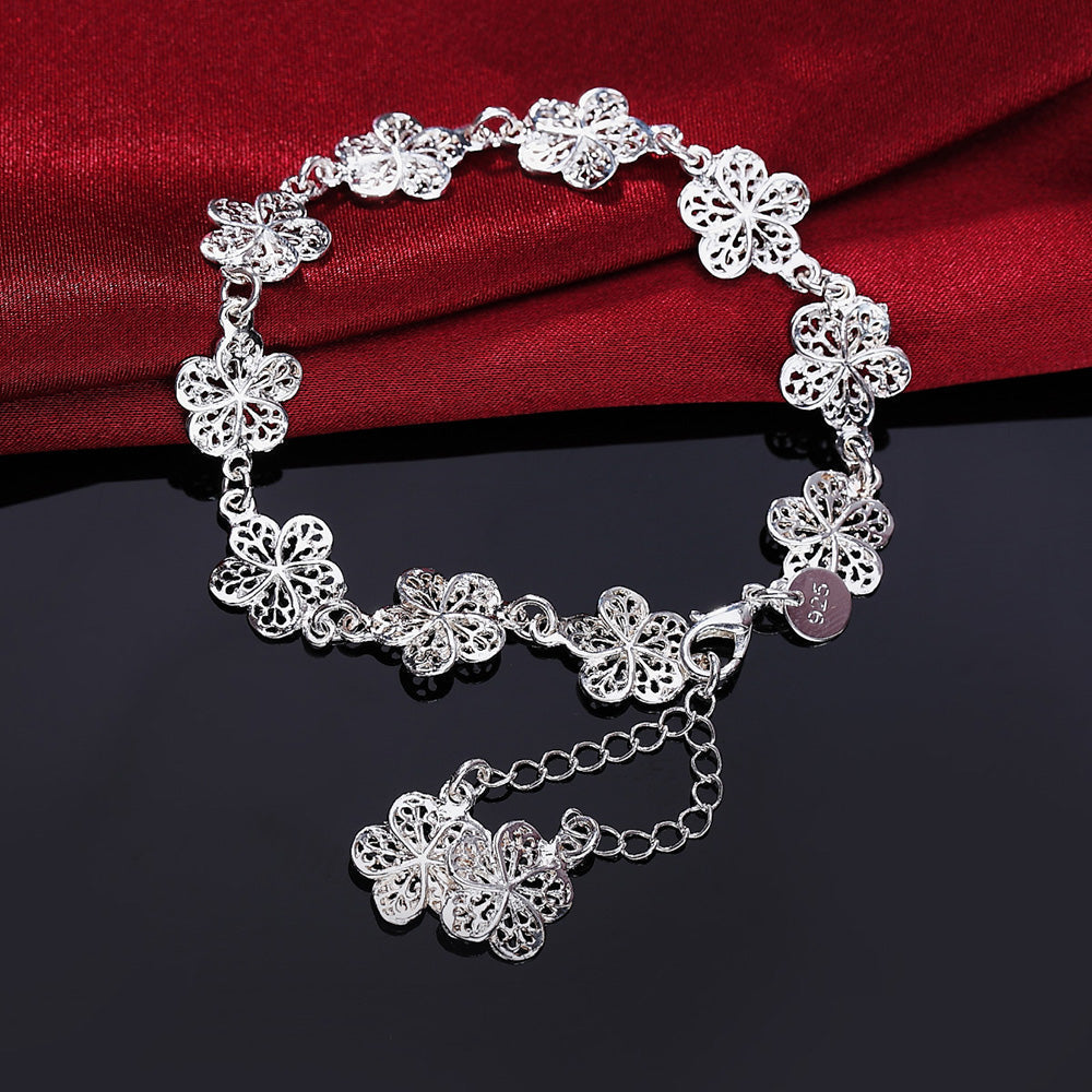 AveleLink - Elegant Silver Filigree Bracelet with Unique Links
