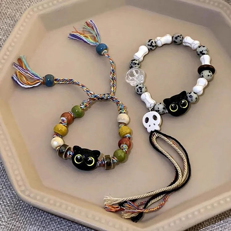 Kyzora Bracelet - Playful Skull and Kitten Charm Design