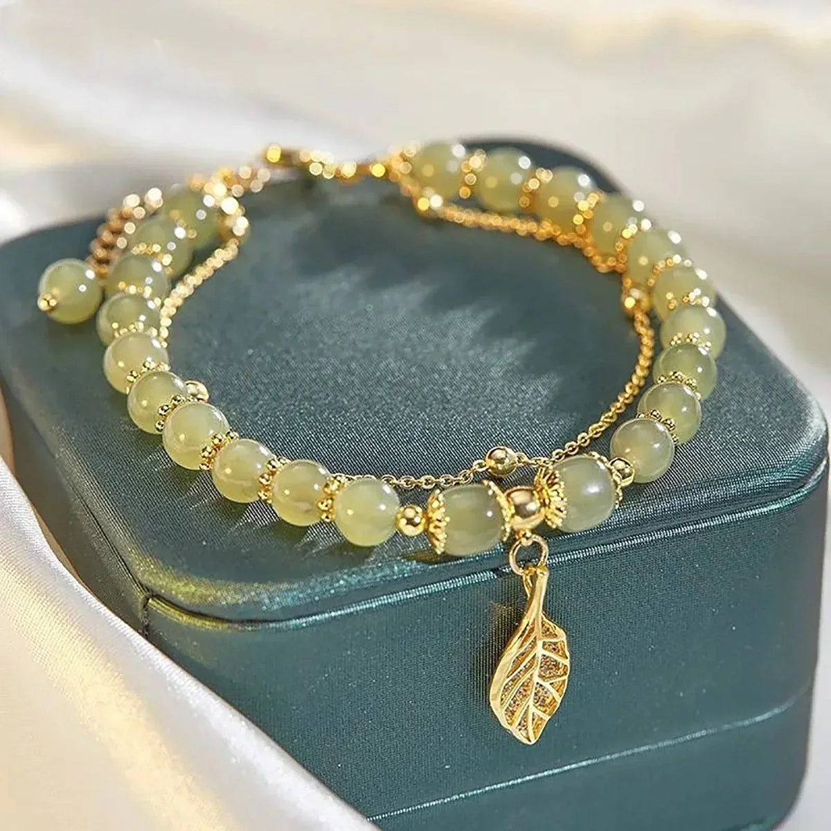 Curanthe Jade Leaf Bracelet - Elegant Charm with Calming Stone Design