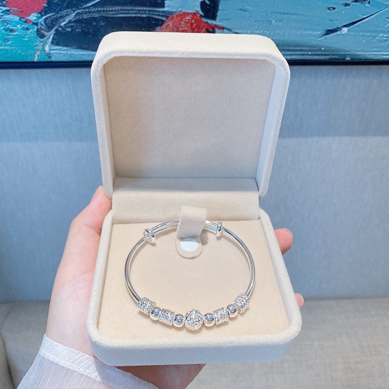 Nuvella - Elegant Silver Lucky Bead Bracelet