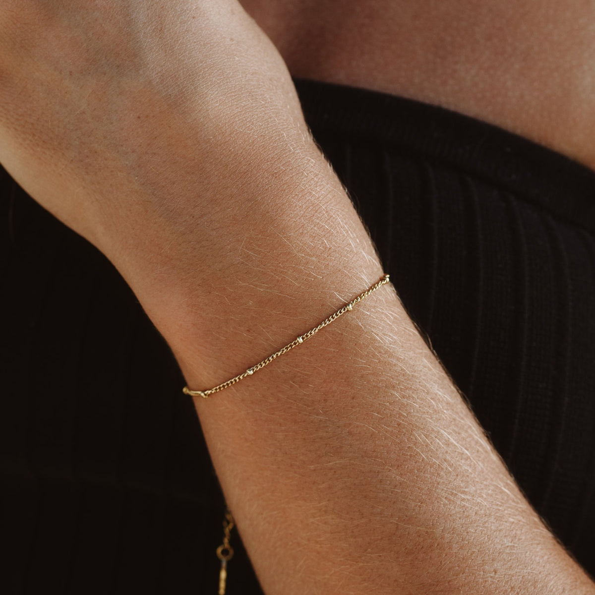 Gwynelle - Elegant Beaded Bracelet with Subtle Charm