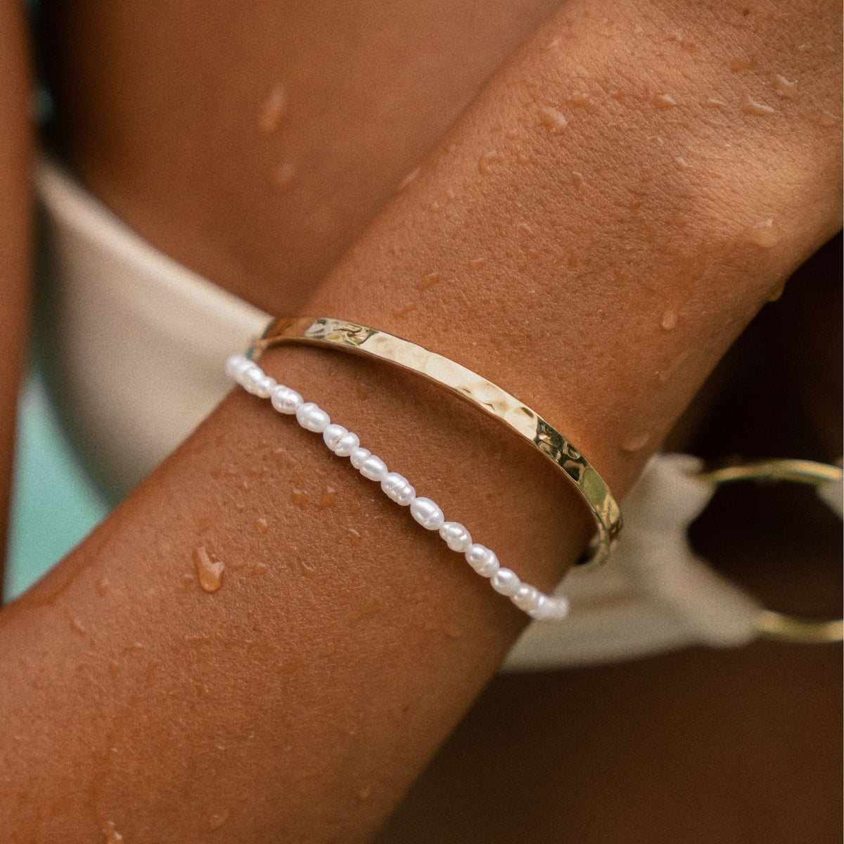 Evarina - Freshwater Pearl Bracelet with Elegant Charm