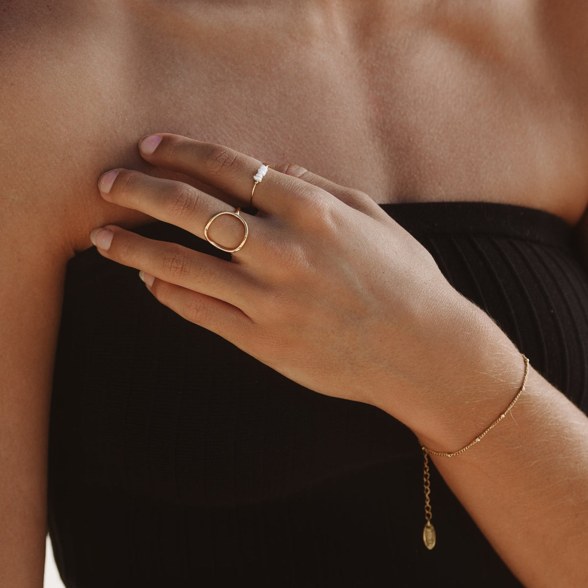 Gwynelle - Elegant Beaded Bracelet with Subtle Charm