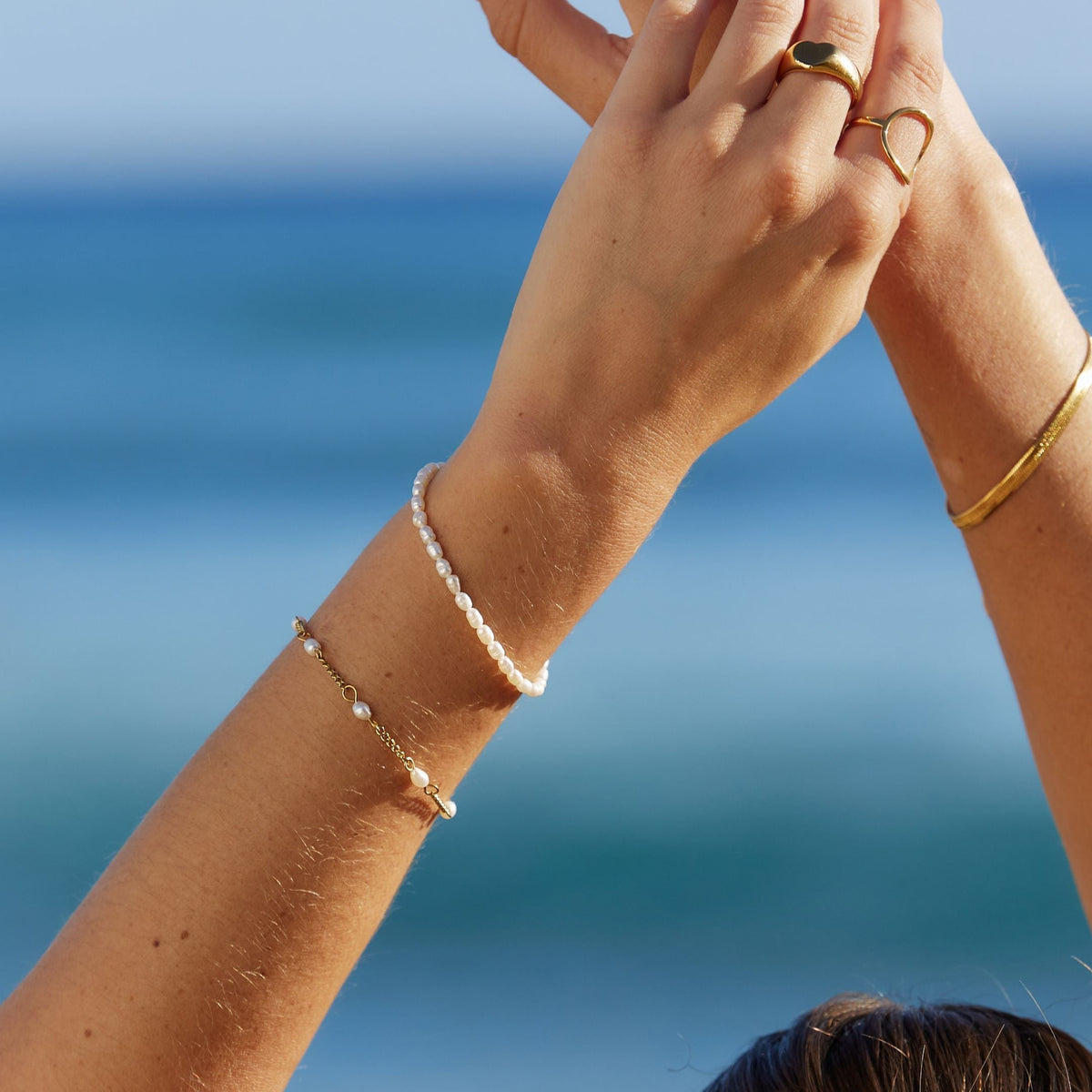 Evarina - Freshwater Pearl Bracelet with Elegant Charm