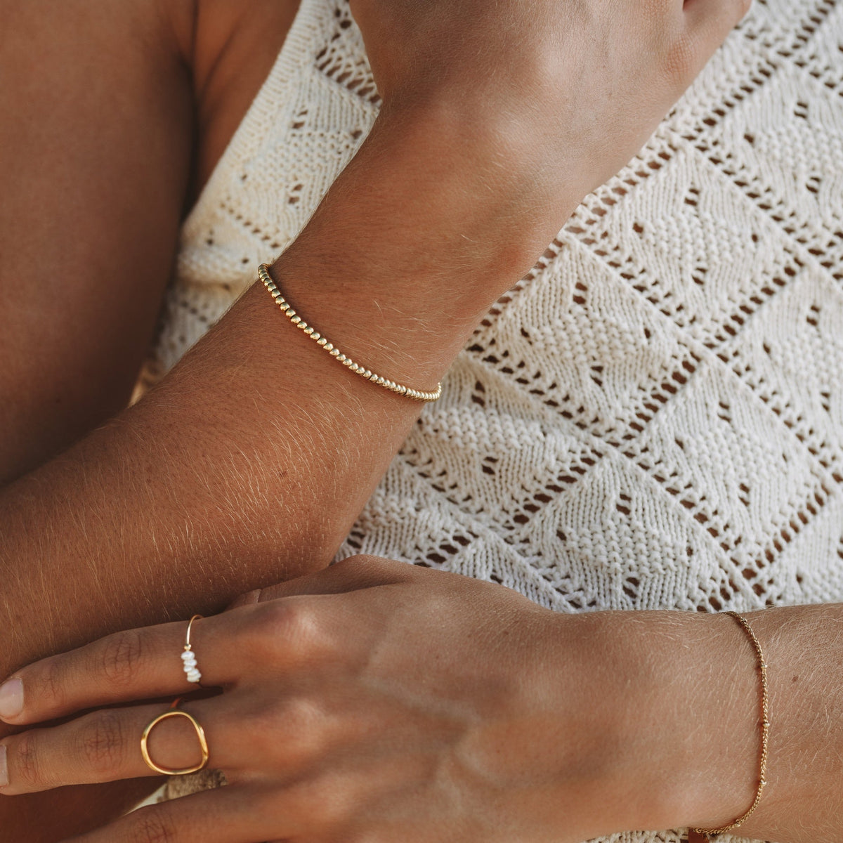 Gwynelle - Elegant Beaded Bracelet with Subtle Charm